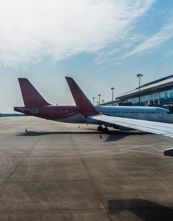 airplanes parked at the airport terminal