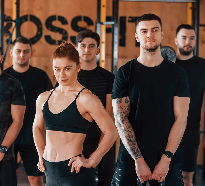 Fitness Group of fit men and women posing